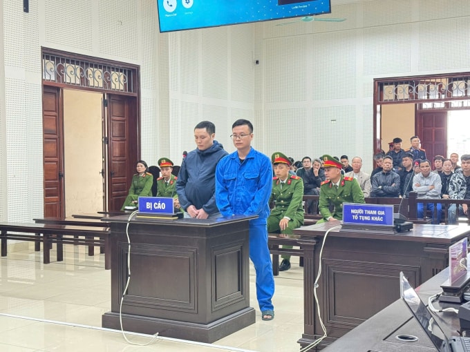 Trần Văn Tài (áo xanh) tại phiên tòa sáng nay. Ảnh: Xuân Hoa