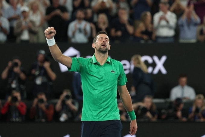 Djokovic mừng chiến thắng tại bán kết Australia Mở rộng, trên sân Rod Laver, Melbourne, Australia, tối 30/1. Ảnh: Reuters
