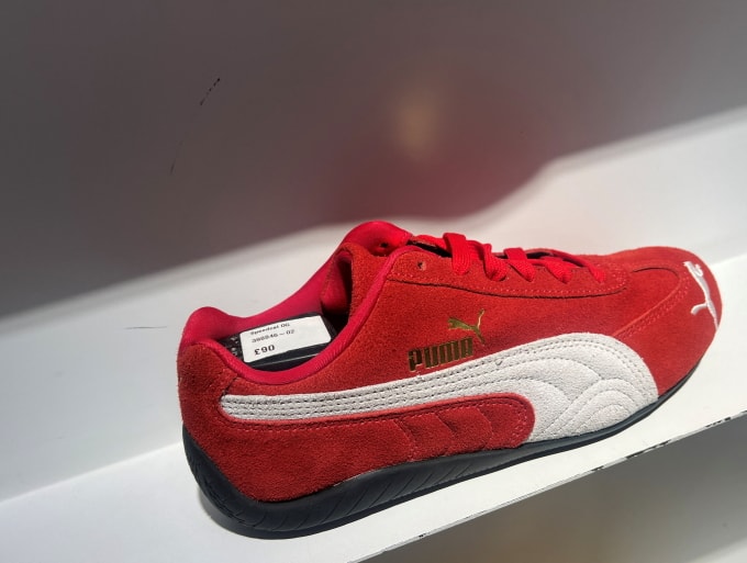 A Puma Speedcat trainer is displayed at a Puma store London, Britain, January 23, 2025. REUTERS/Hannah McKay