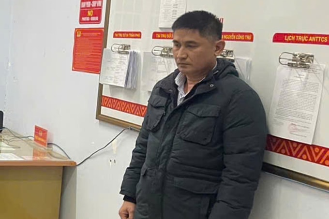 Nguyễn Huy Vũ lúc bị bắt. Ảnh: Ngọc Oanh