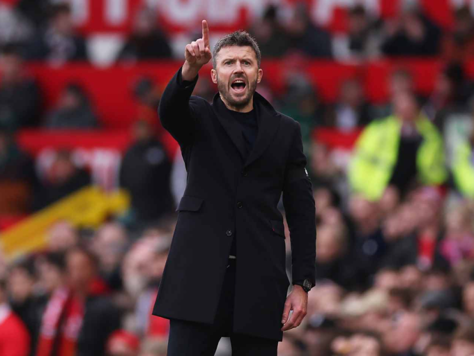 HLV Michael Carrick chỉ đạo trong trận Man Utd thắng Tottenham 2-0 ở vòng 25 Ngoại hạng Anh trên sân Old Trafford, Manchester, Anh ngày 7/2/2026. Ảnh: Reuters