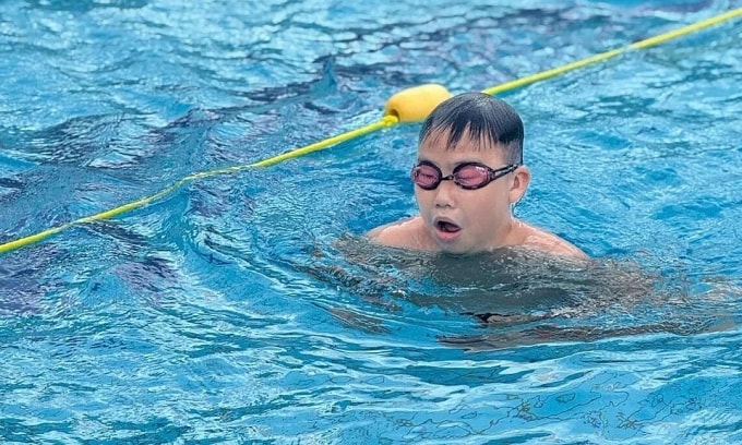 Bryan Lee rèn luyện sức khỏe nhờ môn bơi lội. Ảnh: Straits Times