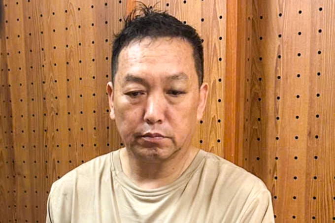 Zhang Junhua khi bị bắt giam. Ảnh: Thành Huynh