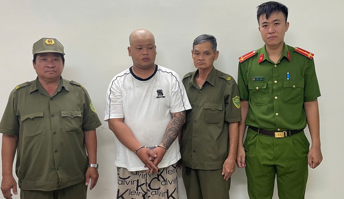 Nguyễn Thành Tài tại cơ quan điều tra. Ảnh: Công an TP HCM