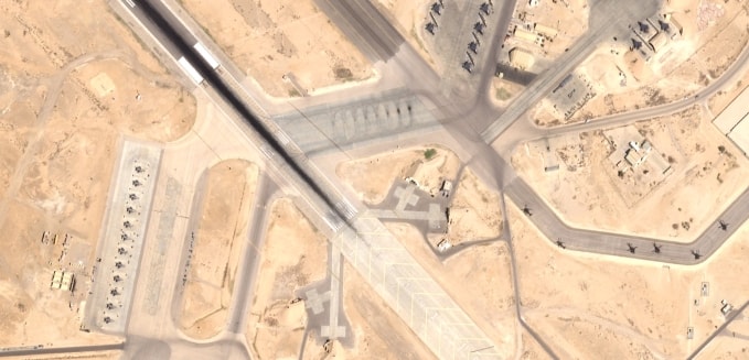 Fighter jets are visible on Friday on the left and at the top at a military base in Jordan. Helicopters can be seen on the right.Credit...Airbus