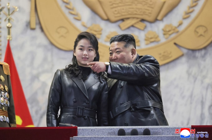This picture taken on February 25, 2026 and released by North Koreas official Korean Central News Agency (KCNA) on February 26, 2026 shows North Korean leader Kim Jong Un (R) and his daughter Kim Ju Ae attending the military parade to commemorate the 9th Congress of the Workers Party of Korea at Kim Il-sung Square in Pyongyang.