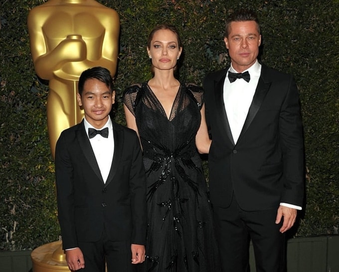 Angelina Jolie và Brad Pitt đưa Maddox đến lễ trao giải Governors Awards năm 2013. Ảnh: AP