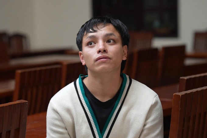 Trần Văn Quốc tại cơ quan công an. Ảnh: Lê Tiến