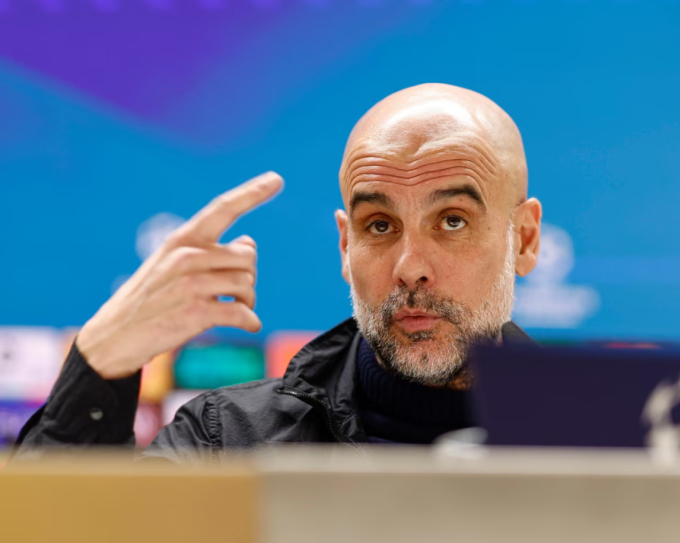 HLV Pep Guardiola trong buổi họp báo trước trận Man City gặp Real Madrid ở lượt đi vòng 1/8 Champions League. Ảnh: EPA