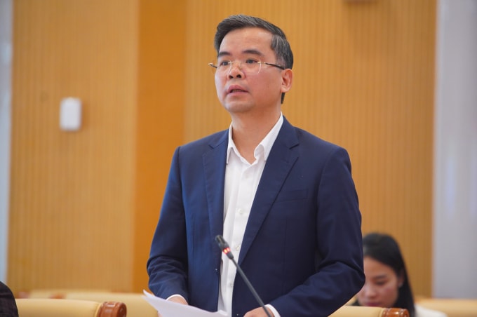 Ông Nguyễn Xuân Bắc, Phó Vụ trưởng Vụ Tín dụng các ngành kinh tế (Ngân hàng Nhà nước), phát biểu tại hội nghị. Ảnh: Tiền Phong