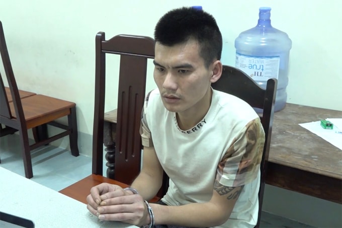 Nghi can Vũ tại cơ quan điều tra. Ảnh: Hòa Vang