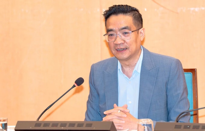 Giám đốc Sở Quy hoạch Kiến trúc Nguyễn Trọng Kỳ Anh tại hội nghị sáng 19/3. Ảnh: Hoàng Phong