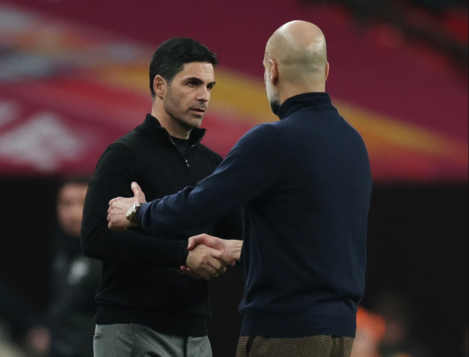 HLV Mikel Arteta bắt tay Pep Guardiola sau trận Arsenal thua Man City 0-2 ở chung kết Cup Liên đoàn trên sân Wembley, London, Anh ngày 22/3/2026. Ảnh: Reuters