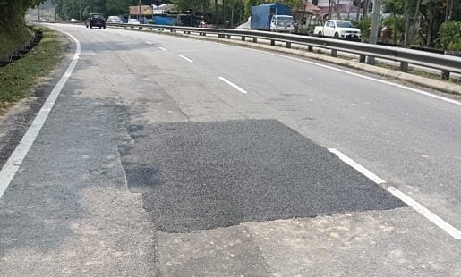 Ổ gà đã được trải nhựa sau vụ tai nạn gây tranh cãi ở Malaysia. Ảnh: YanLili