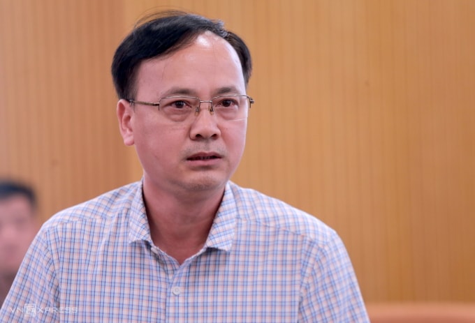 Ông Phan Quang Minh trả lời tại họp báo sáng 1/4. Ảnh: Gia Chính