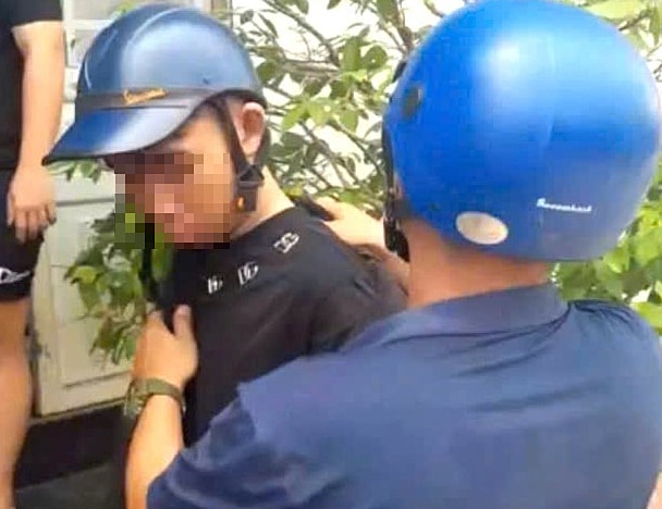 Lê Minh Nghĩa bị bắt giữ sau khi gây án. Ảnh: Thái Hà