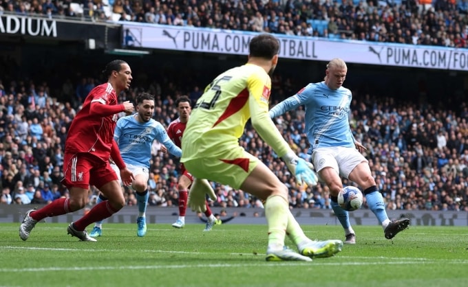 Haaland ghi hat-trick thứ 12 của anh cho Man City. Ảnh: Reuters