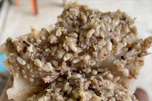 "Cơn ác mộng" từ món đặc sản khiến nhiều người phải nhập viện - Ảnh 1.