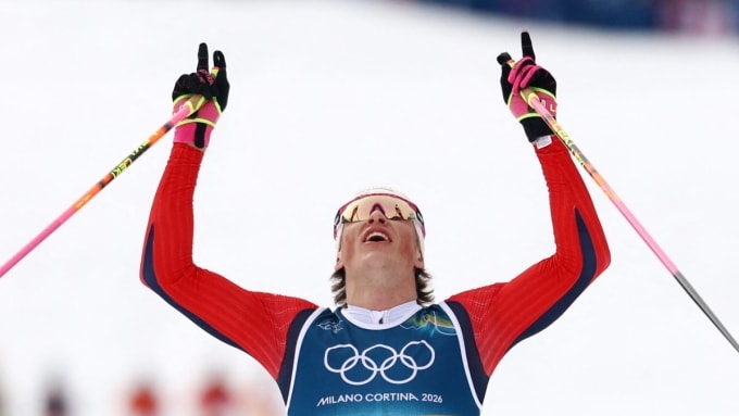 Johannes Hoesflot Klaebo of Norway crosses the finish line to win gold at the Milano Cortina 2026 Olympics, at Tesero Cross-Country Skiing Stadium, Lago, Italy, Feb. 21, 2026. (Reuters Photo)