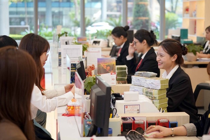 Dự báo lãi suất huy động ổn định quanh mốc 7 % trong năm 2026 - Ảnh 1.