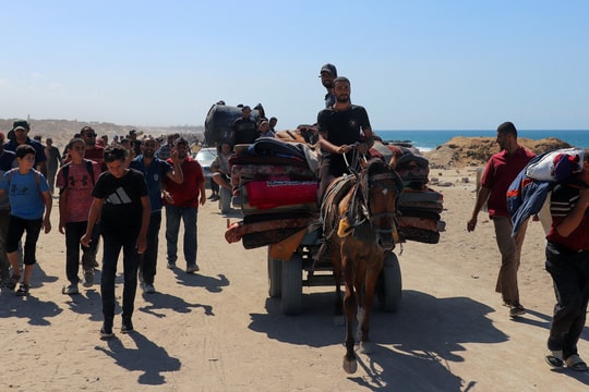 Israel ngừng bắn, hàng nghìn người Gaza quay về nhà