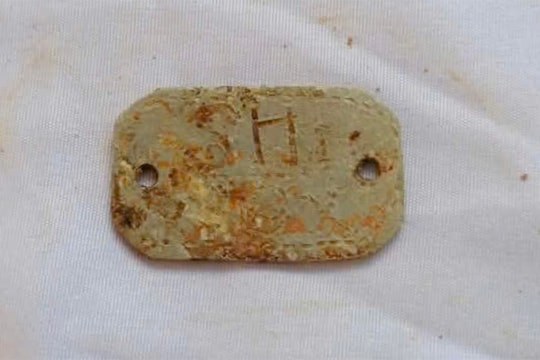 Tìm thấy hài cốt liệt sĩ cùng tấm biển khắc mã 'SH 1-99X'