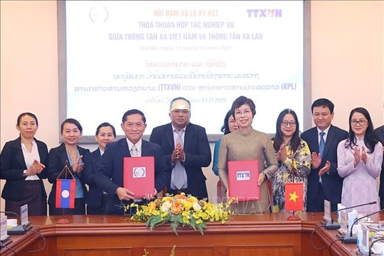 Tổng Giám đốc TTXVN Vũ Việt Trang hội đàm với Tổng Giám đốc Thông tấn xã Pathet Lào