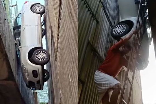 Ôtô rơi lọt giữa hai trụ cầu vượt đang xây