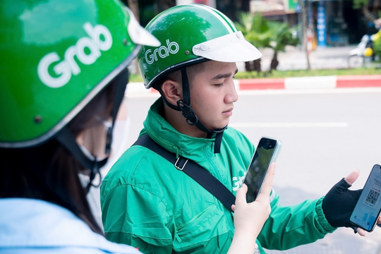 Grab đề xuất Hà Nội hỗ trợ 10 triệu đồng cho tài xế đổi xe máy điện
