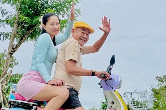 Gu mặc của vợ nghệ sĩ Việt Anh