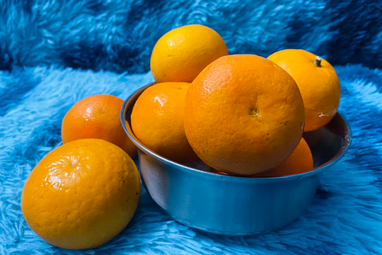 5 lý do nên uống nước cam thường xuyên