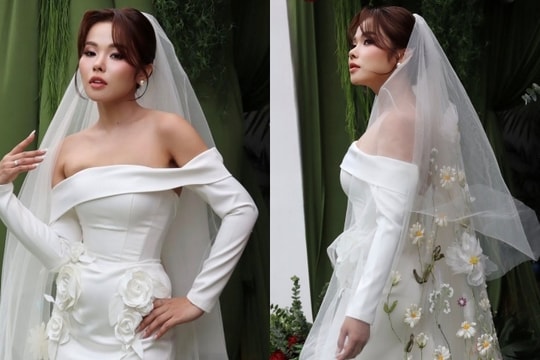 Váy cưới thêu hoa cúc của ca sĩ 'Bốn chữ lắm'