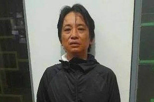 Đầu thú sau khi dùng xăng đốt vợ 'hờ'