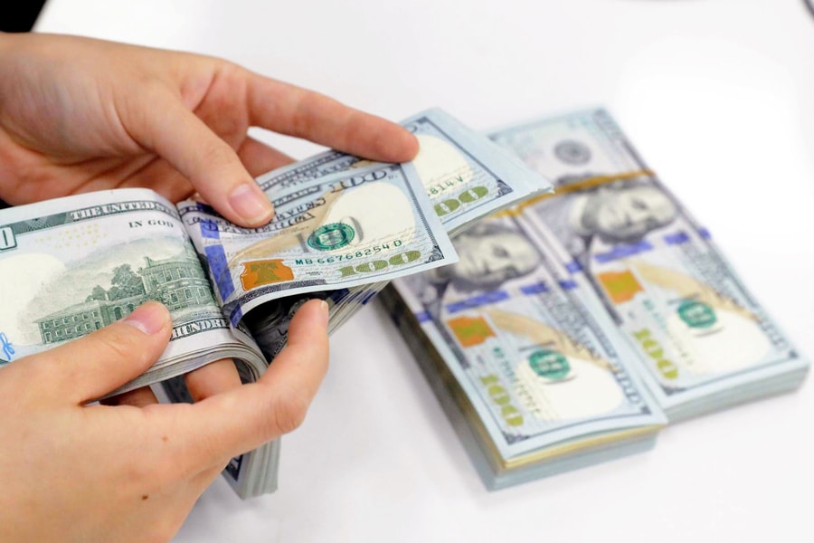 Đồng USD chịu sức ép do nguy cơ thương chiến Mỹ - Trung leo thang