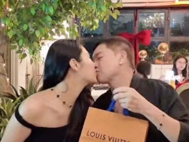 Quang Minh hôn bạn gái kém 37 tuổi ở tiệc sinh nhật