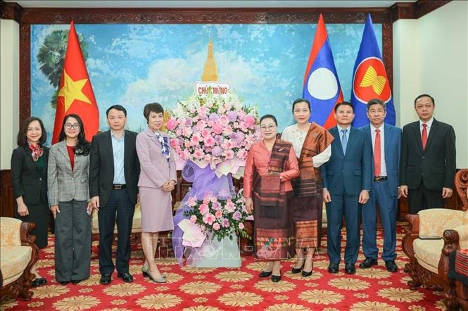 Tổng Giám đốc TTXVN chúc mừng 50 năm Quốc khánh nước CHDCND Lào