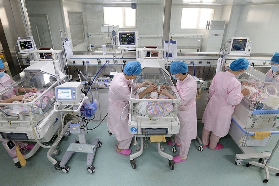 Đẻ con được tặng nhà - cú hích dân số và bất động sản Trung Quốc