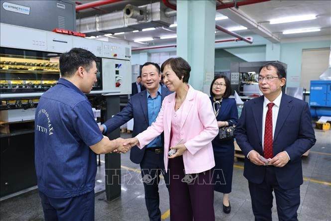 Lãnh đạo TTXVN chúc Tết Công ty TNHH MTV In và Thương mại